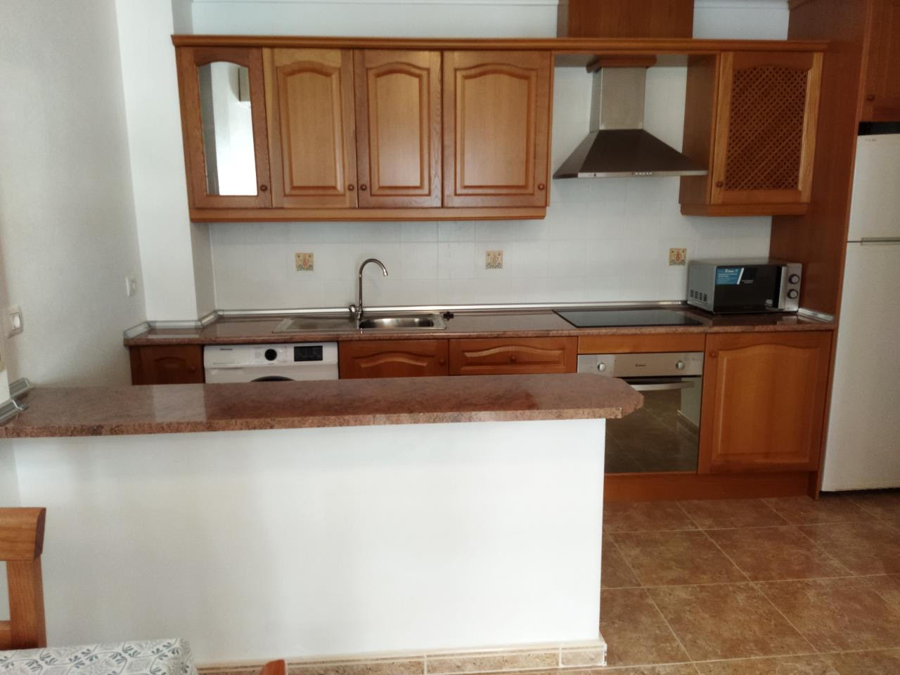 gallery image 2 of Bright Apartment with Pool & Parking in Aguamarina