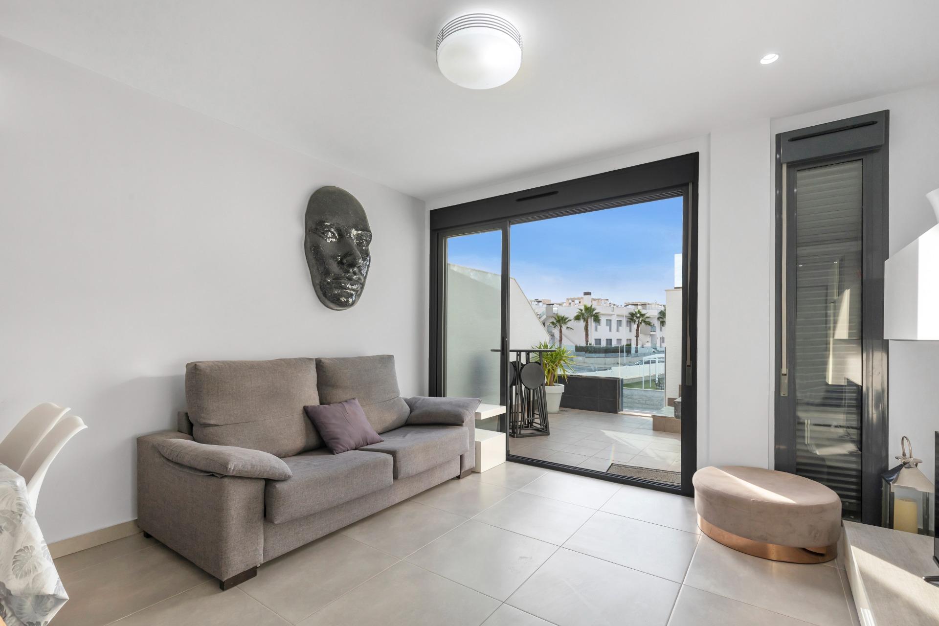 gallery image 4 of Top Floor Bungalow with Private Solarium – Oasis Beach 7, Punta Prima (Torrevieja)