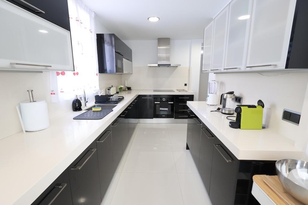 gallery image 3 of Modern 4-Bedroom Villa in Cabo Roig