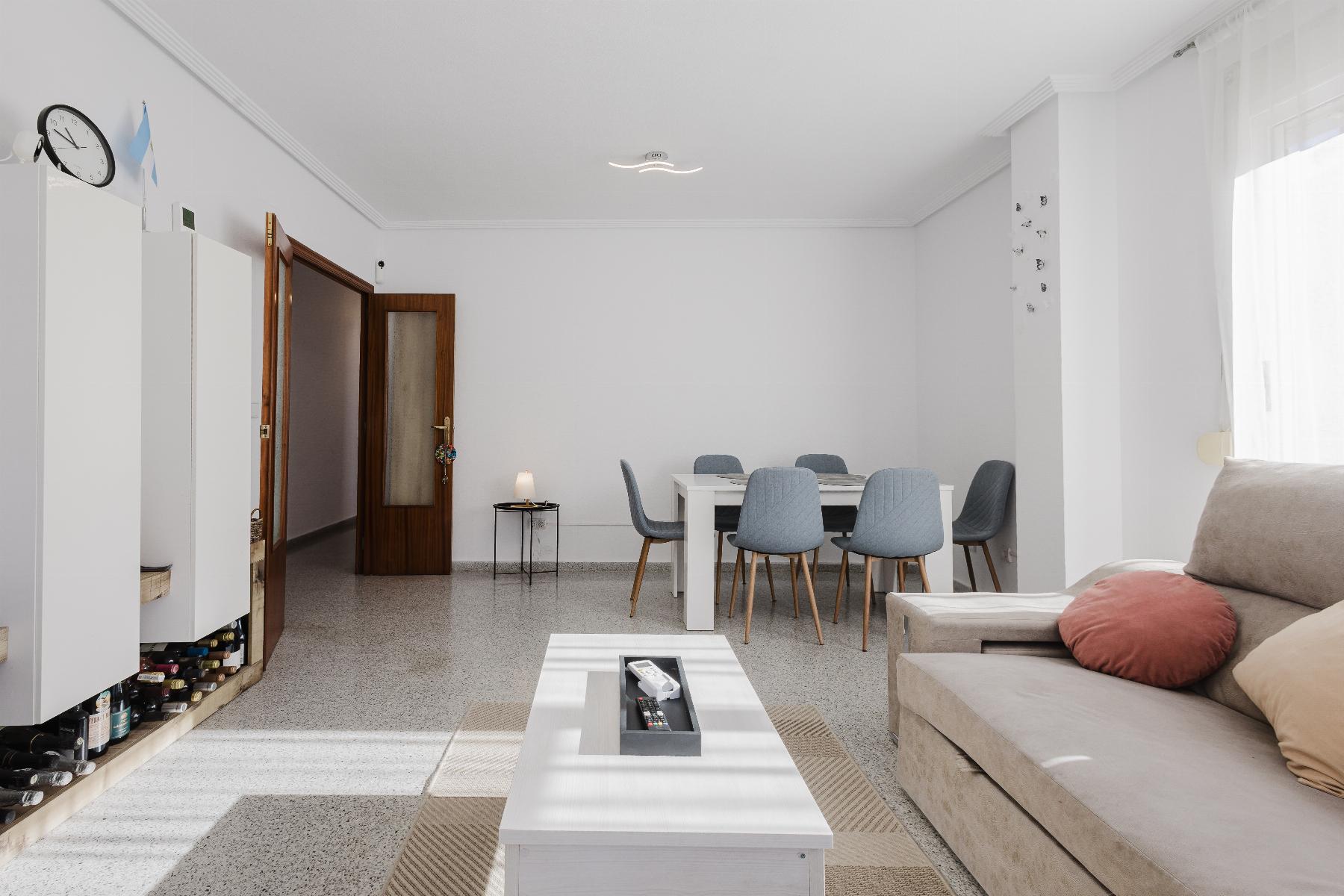 gallery image 3 of Spacious 4-Bed Apartment with Garage & Solarium