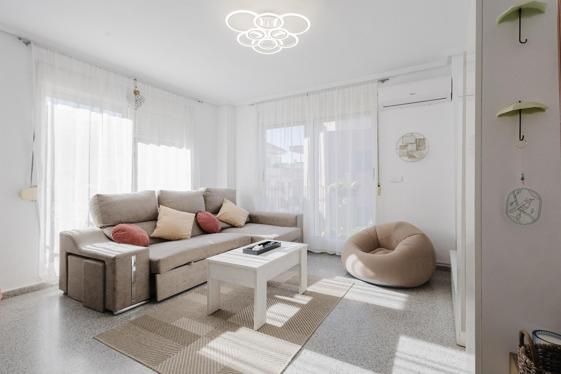 gallery image 2 of Spacious 4-Bed Apartment with Garage & Solarium