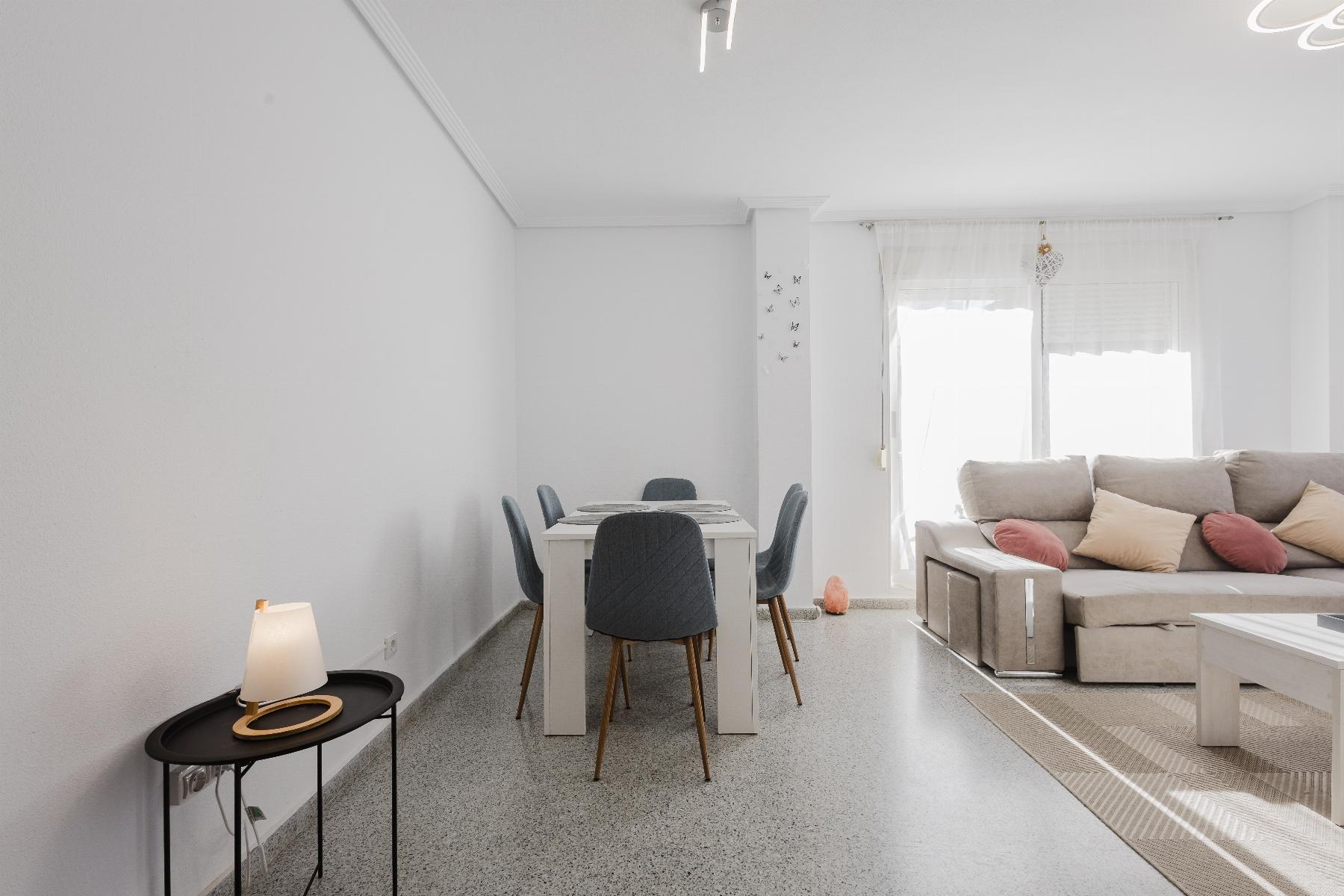 gallery image 1 of Spacious 4-Bed Apartment with Garage & Solarium