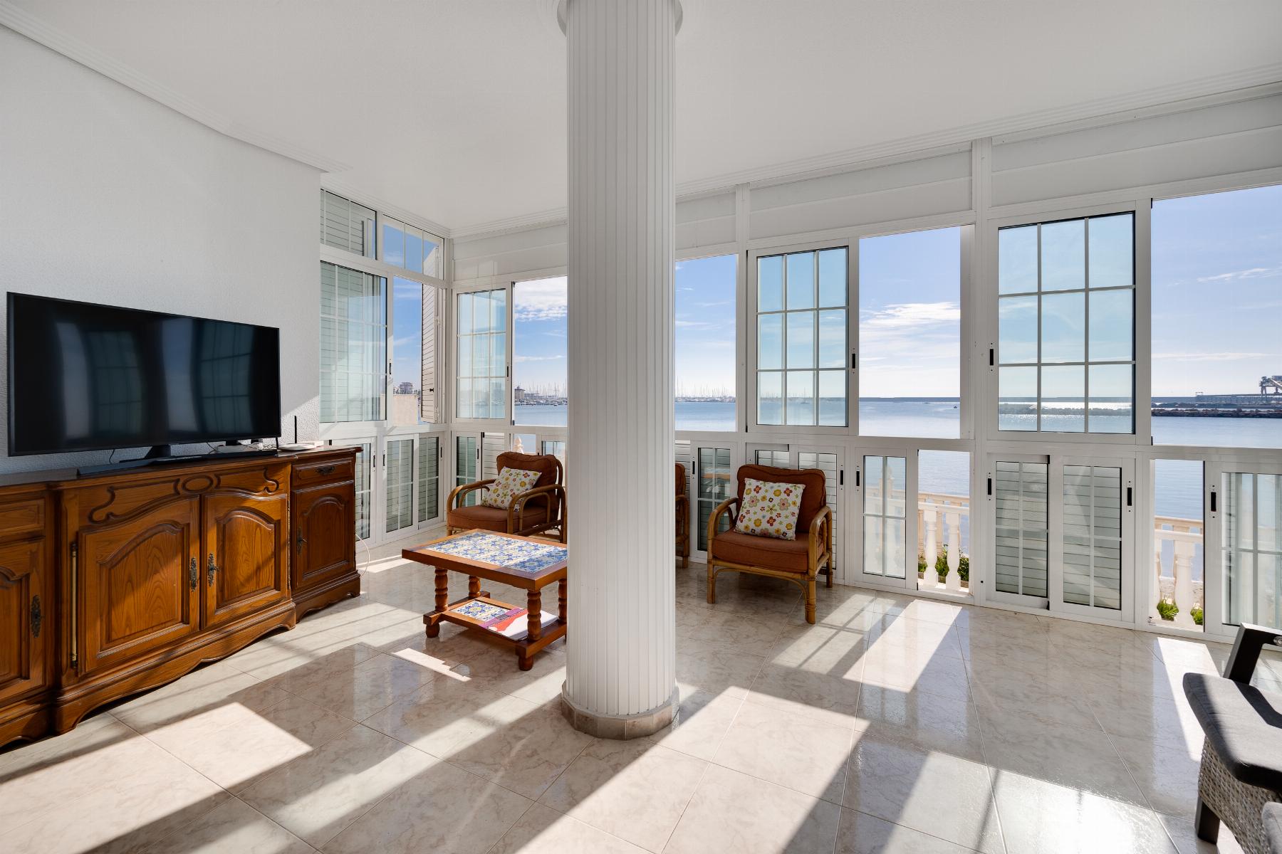 gallery image 4 of Exclusive Frontline Apartment with Sea Views